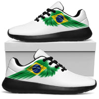 White lace-up sneakers with Brazil flag wing graphic and black trim, black outsole
