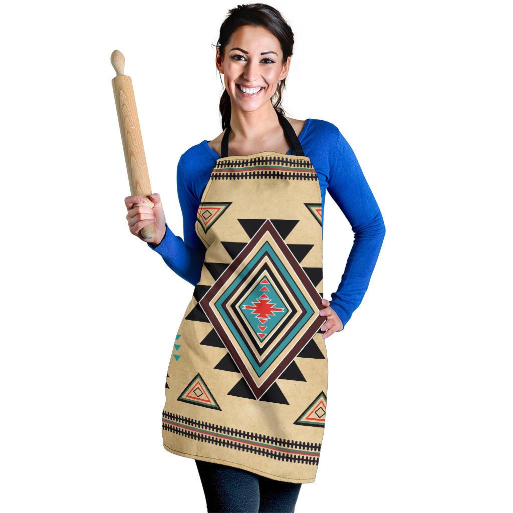 Southwest symbol apron on model, beige fabric with multicolor geometric print and black straps