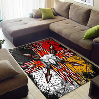 Area rug with bison skull and arrowburst graphic in red, yellow, and black