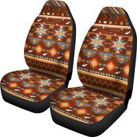 Brown multicolor car seat covers with bird and geometric motifs, black edges