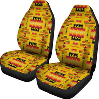 Pair of multicolor yellow tribal car seat covers with geometric print and black edging