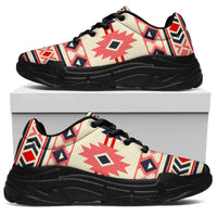 Chunky sneaker side view with cream, pink, and navy tribal pattern; black laces, black sole