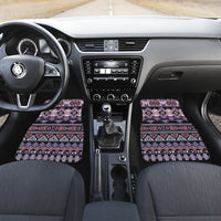 Multicolor Native American patterned front floor mats set in car footwell