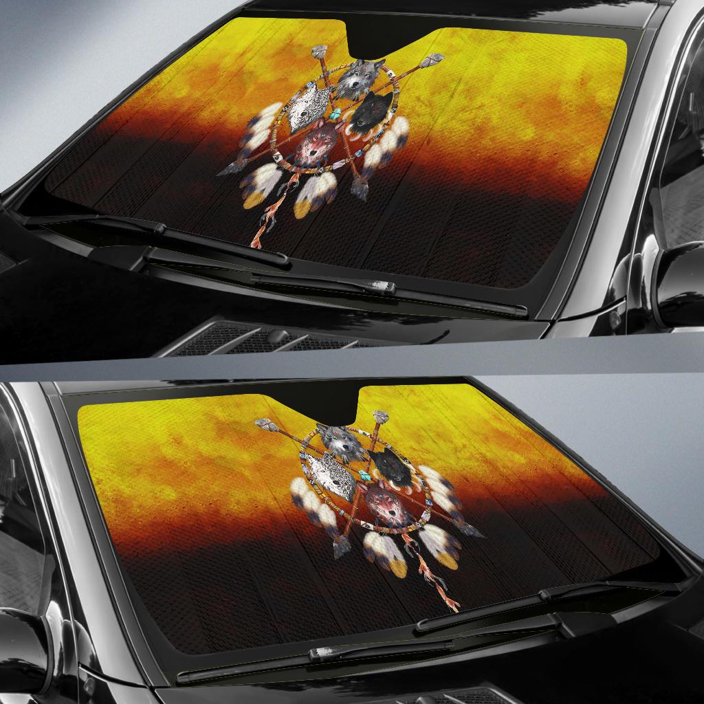 Auto sun shade installed on windshield, showing multicolor Native warrior graphic