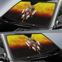 Auto sun shade installed on windshield, showing multicolor Native warrior graphic