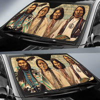 Windshield sun shade installed on car, Native American portrait artwork in multicolor