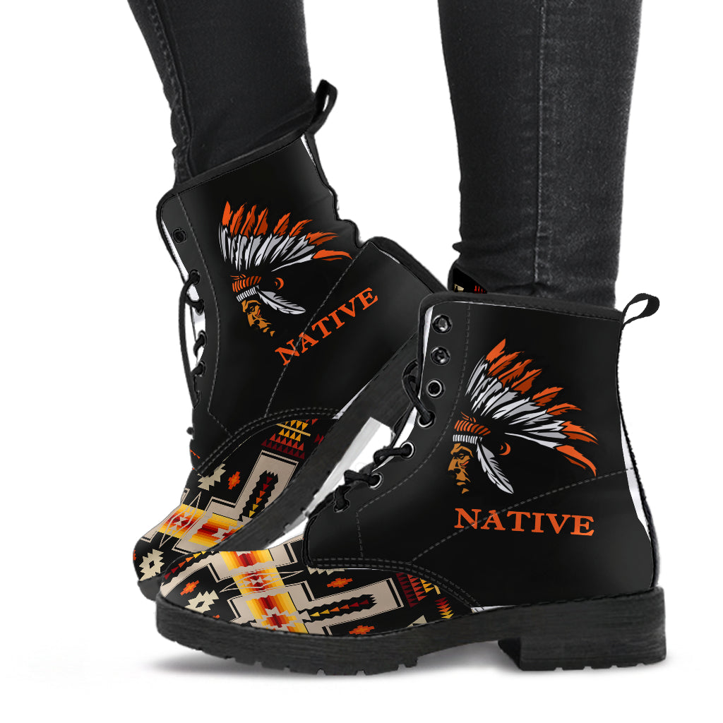 Black leather lace-up boots, side view, multicolor patterned toe and Native head print