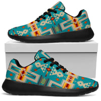Turquoise tribal sport sneakers with black laces, low-profile sole, side view