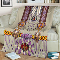 Purple breastplate blanket draped view with beaded fringe and colorful geometric border band