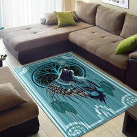 Teal wolf chief area rug with dreamcatcher motif, dark blue and green feather pattern