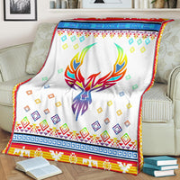 White blanket with multicolor phoenix skull and geometric diamond pattern
