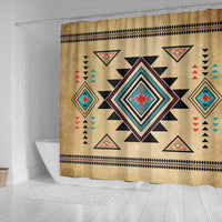 Native style shower curtain in tan with central red, teal, black diamond motif