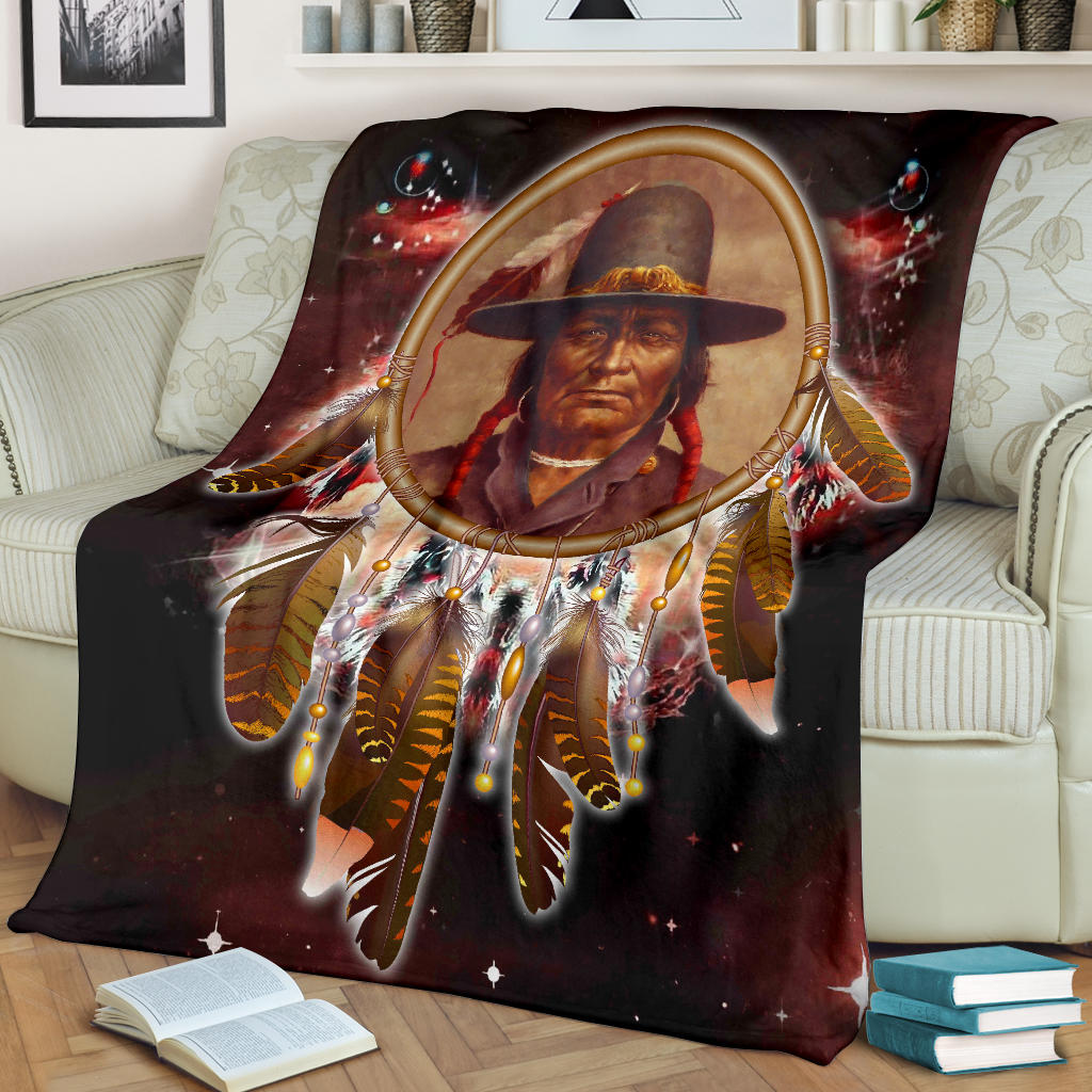 Chief Dream Catcher Red Galaxy Blanket spread on couch with central dreamcatcher graphic