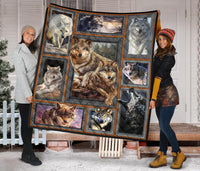 Wolf quilt draped on door porch, nine-panel framed wolves in gray and brown hues