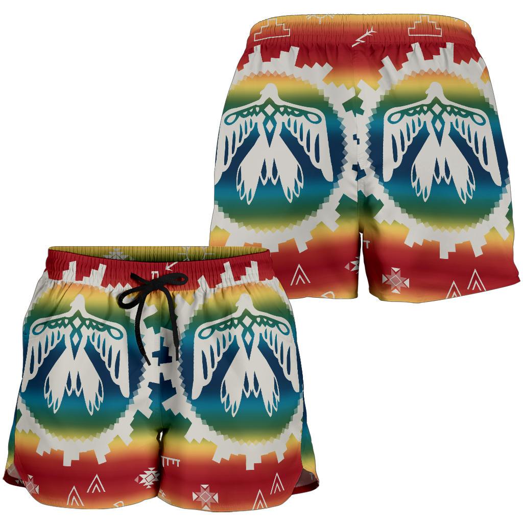 Women’s all-over printed shorts, rear view; multicolor thunderbird and patterned panels.