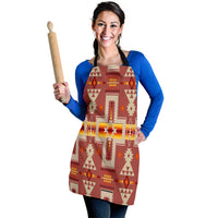 Women’s apron front view in rust red with Native American geometric motifs and chest pocket