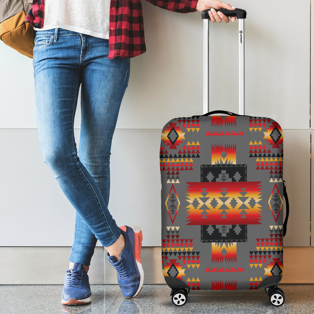 Gray multicolor patterned luggage cover on rolling suitcase, full front view