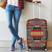 Gray multicolor patterned luggage cover on rolling suitcase, full front view