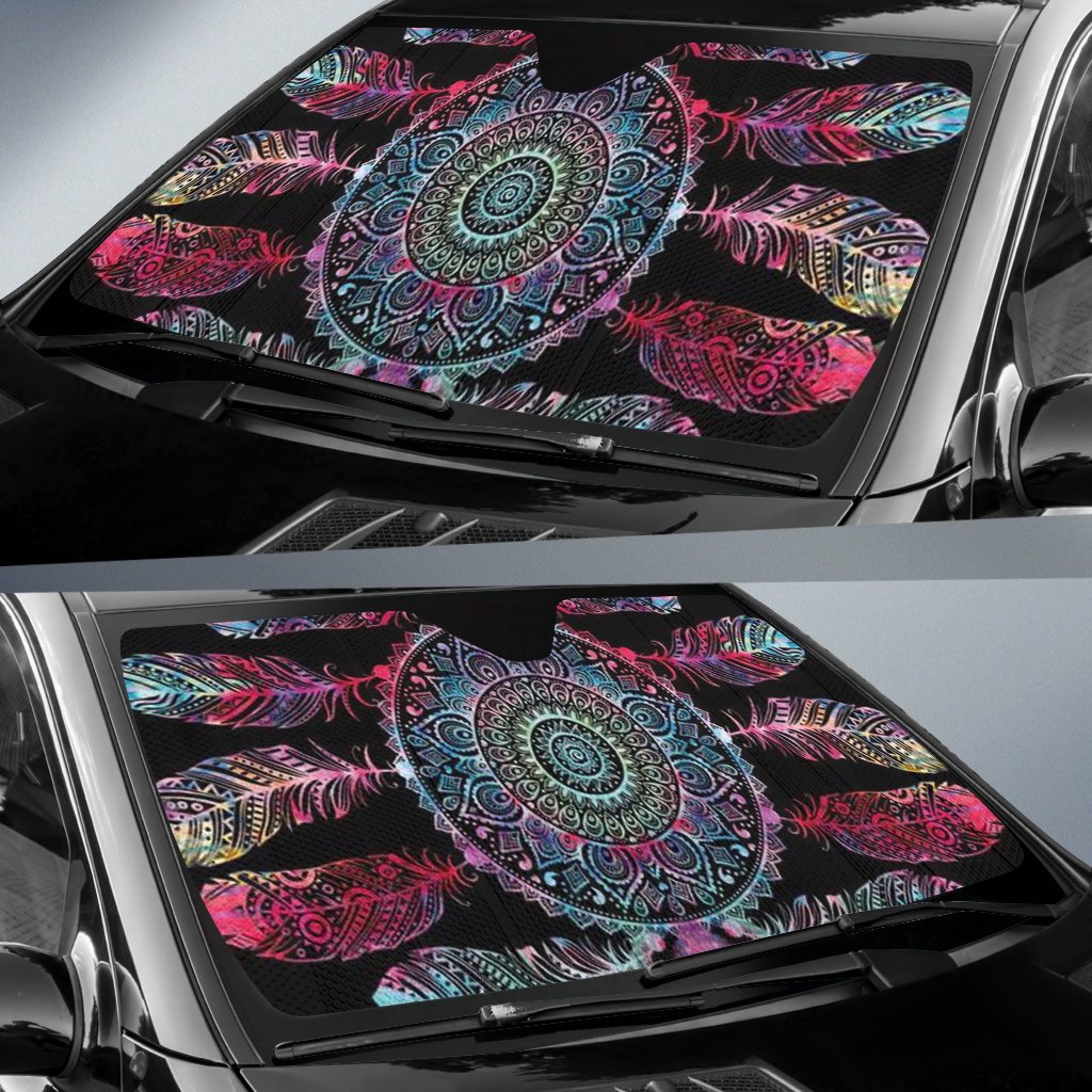Colorful auto sun shade covering front windshield, featuring circular mandala and feather design