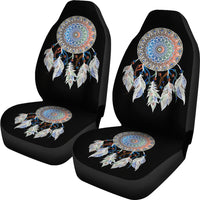 Set of two black car seat covers featuring circular dreamcatcher mandala on backs