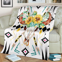 Bison skull blanket with bright sunflower flowers, turquoise leaves, and black diamond trim