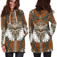 Front view orange hooded dress, teal-and-blue diamond print, bead motif, long sleeves