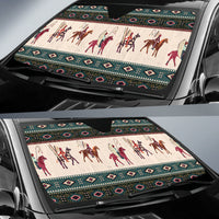 Windshield sunshade showing native horse-rider print with teal geometric trim on cream