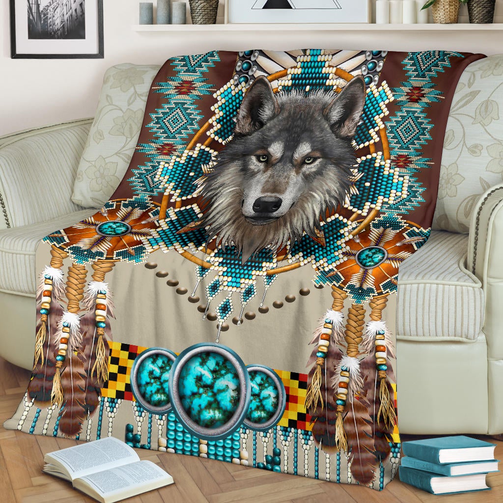 Multicolor wolf blanket with turquoise-and-beige bead patterns and long fringe accents