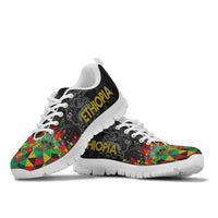 White Ethiopia sneakers with colorful geometric sides, lace-up design and chunky white tread sole