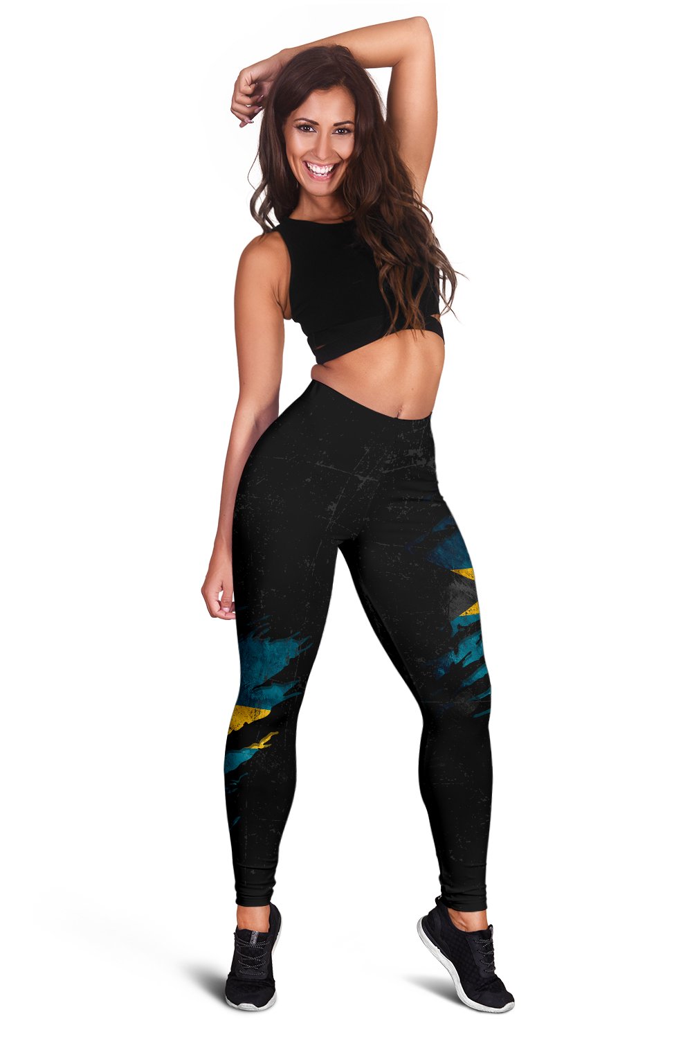Women's leggings front view, black base with teal wave pattern and yellow highlights