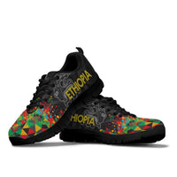 Pair of black Ethiopia sneakers with colorful geometric side panels and bold ETHIOPIA logo