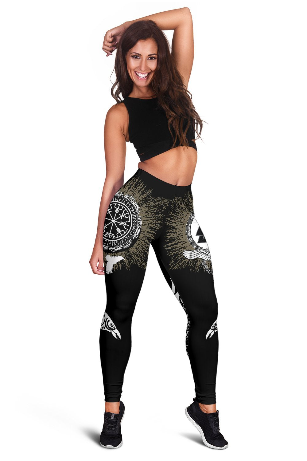 Black women’s leggings with gold texture-style panels and centered circular rune design