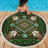 Green mandala beach blanket, white fringe edge, teal circle accents and bead patterns