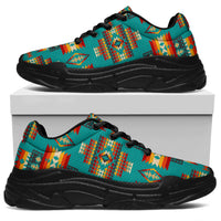 Blue patterned chunky sneakers, lace-up, black outsole, front side view
