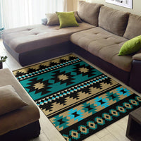 Aztec area rug with teal, tan, and black zigzag stripes and diamond motif