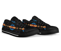 Black low-top lace sneakers with blue Native American pattern, side view