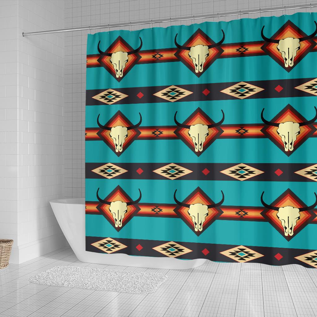 Blue shower curtain, partial view with bull skull icons and geometric stripes