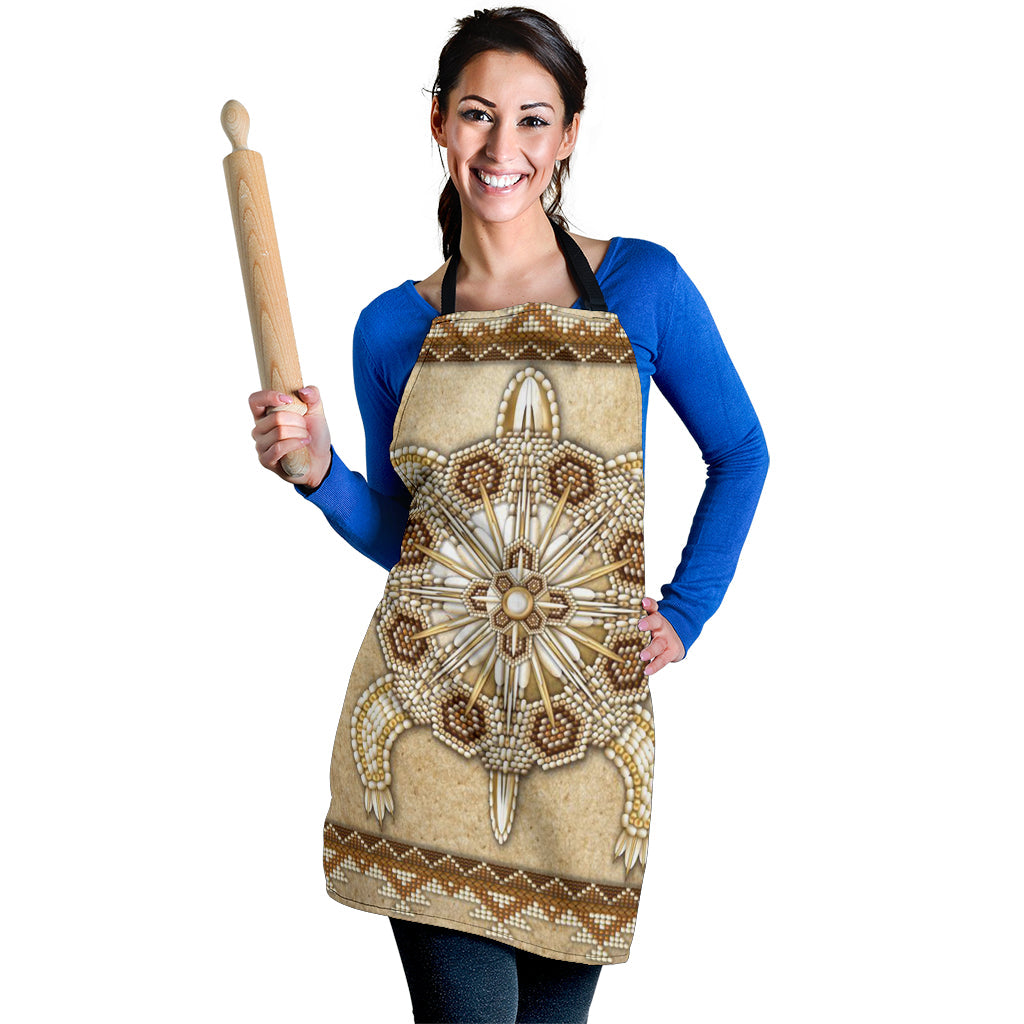 Tan beaded apron front, gold-and-white sunburst design with brown geometric border