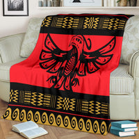 Red Native pride blanket with black eagle graphic and gold patterned trim border
