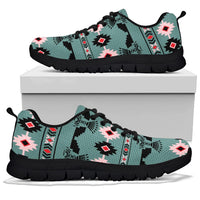 Turquoise printed sneakers on a box top view, black outsole and lace-up front