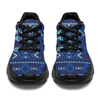 Back view chunky lace-up sneakers with navy-blue geometric tribal pattern and black sole