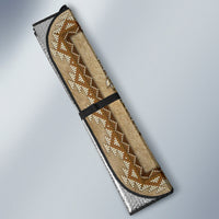 Single tan auto sun shade with beadwork floral totem pattern and black edge