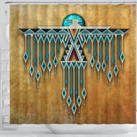 Close view of tan shower curtain with turquoise, white, and red Thunderbird beadwork