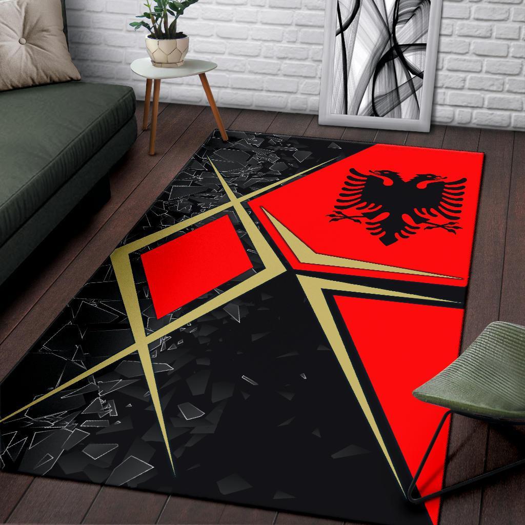 Large area rug in black and red with Albanian eagle, gold star outline and shards