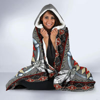 Hooded blanket with full hood up, Native pattern in red, black, and white on gray