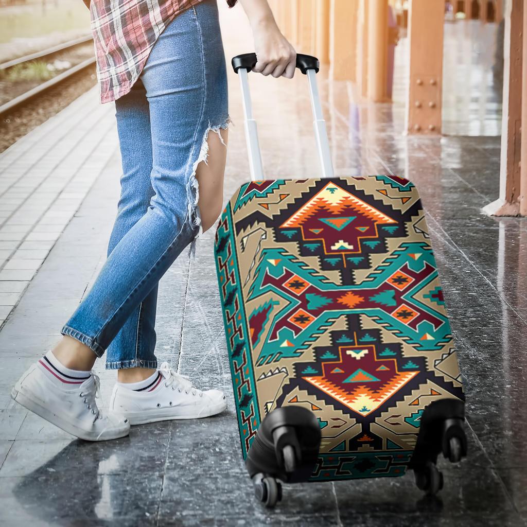 Teal and orange geometric tribal luggage cover on rolling suitcase shell
