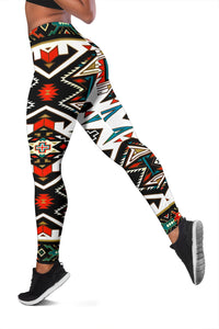 Side view of colorful tribal geometric leggings with black-and-white zigzag pattern