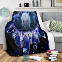 Wolf dreamcatcher blanket in blue and dark tones with feathered web pattern