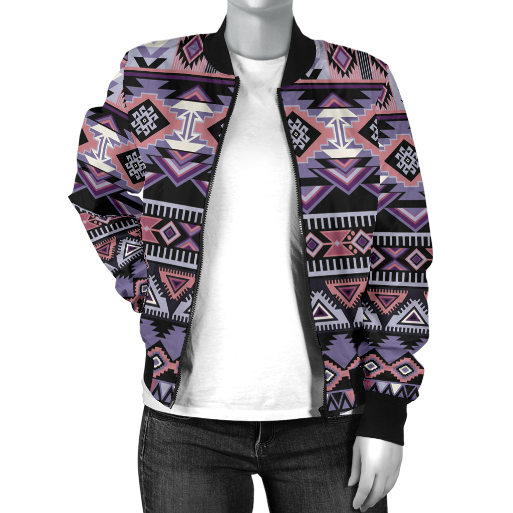 Women’s bomber jacket with geometric Aztec print, black collar and front zipper, worn over white tee