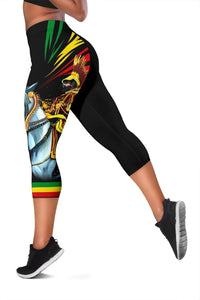 Black capri leggings with multicolor portrait and flag graphic down one leg